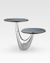 As eye-catching as the cakes and tarts it's designed to support, this two-tier server creates its own spotlight on any table. Handcrafted with glass platforms and a curved, lustrous alloy base. 12H X 15 diam. Hand wash Imported