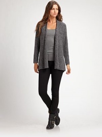 A classically feminine shawl collar meets a flattering fit giving this knit sweater simple sophistication.Shawl collarLong sleevesOpen-front styleHi-lo hemAbout 30 from shoulder to hemMerino wool/nylon/cashmereDry cleanImported of Italian fabric Model shown is 5'11 (180cm) wearing a US size Small. A classically feminine shawl collar meets a flattering fit giving this knit sweater simple sophistication.Shawl collarLong sleevesOpen-front styleHi-lo hemAbout 30 from shoulder to hemMerino wool/nylon/cashmereDry cleanImported of Italian fabric Model shown is 5'11 (180cm) wearing a US size Small.