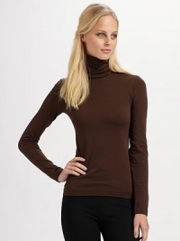 Velvet soft and made in a stretch cotton seamless knit, this pullover is light enough for layering.50% cotton/46% nylon/4% elastene Dry clean Imported Velvet soft and made in a stretch cotton seamless knit, this pullover is light enough for layering.50% cotton/46% nylon/4% elastene Dry clean Imported