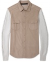 This Sean John shirt blends the warmth of a sweater with the dressier style of a button down.
