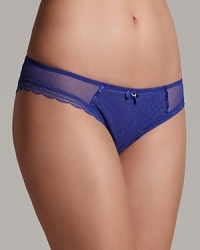 A low-rise silhouette with slightly more coverage than a thong from Chantelle. Sheer detail at hips and scalloped edge trim along legs add a sexy touch. Style #3643. A low-rise silhouette with slightly more coverage than a thong from Chantelle. Sheer detail at hips and scalloped edge trim along legs add a sexy touch. Style #3643.
