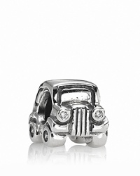 A whimsical vintage-style car charm with sparking head and tail lights in white and red cubic zirconia. From PANDORA.