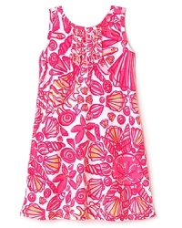 Perfect for warm-weather style - and comfort - the classic shift is transformed with allover seashell print, ruffles along the neck and back keyhole opening. Perfect for warm-weather style - and comfort - the classic shift is transformed with allover seashell print, ruffles along the neck and back keyhole opening.
