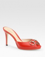 Classic leather silhouette with a low-cut front, silvertone horsebit detail and peep toe. Self-covered heel, 4 (100mm)Covered platform, ½ (15mm)Compares to a 3½ heel (90mm)Leather upperLeather liningBuffed leather solePadded insoleMade in ItalyOUR FIT MODEL RECOMMENDS ordering true size