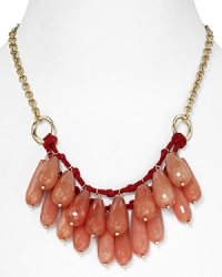 Take this season's love of bold colors to your jewel box with this beaded bib necklace from Aqua, accented by a cluster of coral drop beads and a textured chain. Take this season's love of bold colors to your jewel box with this beaded bib necklace from Aqua, accented by a cluster of coral drop beads and a textured chain.