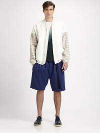 An edgy rethinking of the classic baseball jacket, with striped sleeves, and back covered with knotted fringe.Ribbed knit band collarFront zipperLong striped sleeves with solid ribbed knit cuffsSolid front body and back yokeStriped back body with fringeSide-seam snap pocketsRibbed knit waistCottonDry cleanImported An edgy rethinking of the classic baseball jacket, with striped sleeves, and back covered with knotted fringe.Ribbed knit band collarFront zipperLong striped sleeves with solid ribbed knit cuffsSolid front body and back yokeStriped back body with fringeSide-seam snap pocketsRibbed knit waistCottonDry cleanImported