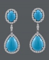 Sweet summertime sparkle. Carlo Viani's vivacious drop earrings feature oval and pear-cut turquoise (10-3/4 mm) surrounded by round-cut white sapphires (1-5/8 ct. t.w.). Crafted in 14k white gold. Approximate drop: 1-1/4 inches.