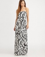 For a casual-cool spring look that is sure to turn heads, this floor-sweeping maxi dress in a bold, vibrant print is the perfect choice. StraplessBuilt-in bra for added supportBanded elastic waistAllover graphic printAbout 62 from natural waist92% modal/8% spandexDry cleanMade in USAModel shown is 5'9 (176cm) wearing US size Small.