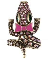 Reptilian rings are all the rage. Betsey Johnson's wrap ring takes a bite out of boring style with an alligator design embellished with multi-colored crystal accents. Crafted in antiqued gold tone mixed metal. Ring adjusts to fit finger.