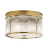With its timeless, radiant design, this Ralph Lauren flush mount lamp is an ideal way to lend luxurious light to smaller spaces.