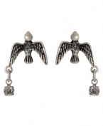 Free-flying style by Betsey Johnson. These silvertone mixed metal earrings feature crystal accents. Approximate drop: 1 inch.