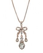 Add sparkle and shine in an instant. This pretty bow necklace by 2028 features a chic, rose gold tone mixed metal setting decorated with sparkling crystals. Approximate length: 16 inches + 3-inch extender. Approximate drop: 2-1/2 inches.