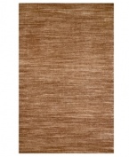 Variegated coloration in subtle striping gives way to modern texture and simple elegance in the Corsica area rug from Liora Manne. Hand-woven in India of pure wool fibers, the Madrid area rug is a comforting, stylish addition to any decor.