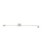 Show your romantic side with Swarovski's interlocking heart bracelet. Made in gold tone mixed metal with crystal embellishments. Approximate length: 7 inches.