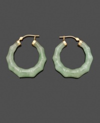 Add a little luck and a lot of style in this fresh take on the traditional hoop. Solid jade (30 mm) in an intricate bamboo shape adds subtle color and uniqueness to your look. Crafted in 14k gold. Approximate diameter: 1-1/2 inches. Add a little luck and a lot of style in this fresh take on the traditional hoop. Solid jade (30 mm) in an intricate bamboo shape adds subtle color and uniqueness to your look. Crafted in 14k gold. Approximate diameter: 1-1/2 inches.