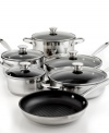 In an instant, a professional kitchen created! You'll take a shine to this heavy-gauge set, which includes all of the essentials for efficient cooking, plus a tri-ply encapsulated base construction that guarantees fast, even heating. Each piece is coated in Whitford's Quantanium nonstick for incredibly quick and easy food release and a hassle-free cleanup. 5-year warranty.