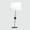 Polished nickel finish over metal with matte black accents. Hi-Lo switch. Ascot white fabric shade with top diffuser.