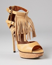 The fringe is in--soft suede spills down the front of the Nadeline sandals from Boutique 9, offered in luscious teal or classic tan. The fringe is in--soft suede spills down the front of the Nadeline sandals from Boutique 9, offered in luscious teal or classic tan.