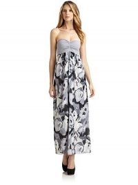 THE LOOKStrapless ruched knit bodiceShimmer floral woven skirtEmpire waistPleated skirtSide zipper with hook-and-eye closureTHE FITAbout 47 from top to hemTHE MATERIALBody: nylon/lycra spandexCombo: cotton voileFully linedCARE & ORIGINDry cleanImportedModel shown is 5'11 (180cm) wearing US size 4. THE LOOKStrapless ruched knit bodiceShimmer floral woven skirtEmpire waistPleated skirtSide zipper with hook-and-eye closureTHE FITAbout 47 from top to hemTHE MATERIALBody: nylon/lycra spandexCombo: cotton voileFully linedCARE & ORIGINDry cleanImportedModel shown is 5'11 (180cm) wearing US size 4.