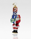 For collectors both old and new, Jolly Santa carefully holds a stack of presents, each adorned with a single number to commemorate a new year. Hand-blownHand-painted6½ highMade in Poland