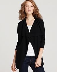 Add a refined layer to your look with this Theory cardigan, the grab-ang-go piece you'll come to covet in no time. Perfect for the office and weekends alike--why not buy two? Add a refined layer to your look with this Theory cardigan, the grab-ang-go piece you'll come to covet in no time. Perfect for the office and weekends alike--why not buy two?