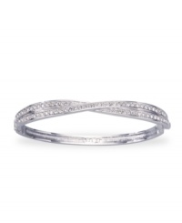 A twist on classic style, from Swarovski. Add some shimmer to your wrist with this Edith bangle bracelet featuring sparkly crystal accents. Crafted in rhodium-plated mixed metal. Approximate diameter: 3-1/4 inches. A twist on classic style, from Swarovski. Add some shimmer to your wrist with this Edith bangle bracelet featuring sparkly crystal accents. Crafted in rhodium-plated mixed metal. Approximate diameter: 3-1/4 inches.