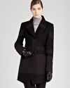 Chic winter style is a cinch with this REISS Laurent coat. Contrast paneling and an asymmetric closure lends a sleek touch to this warm wool blend layer.