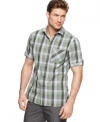 Sticks and stones. Break your outfit out of its rut with this earth tone plaid shirt.