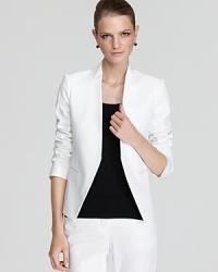 A collarless Theory jacket is a modern layering piece, perfect over a tee with skinny jeans or tailored pants. Take it away with you on your tropical escape and define sleek. A collarless Theory jacket is a modern layering piece, perfect over a tee with skinny jeans or tailored pants. Take it away with you on your tropical escape and define sleek.