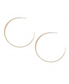 Smooth loops for a touch of scintillating style. Jessica Simpson's chic hoop earrings are every girl's go-to accessory! Crafted in worn gold tone mixed metal. Approximate diameter: 1-1/2 inches.