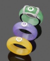 Beautiful bands in brilliant, vivid colors. Choose from green, purple, or yellow jade rings (8 mm) and slip on an intricate sterling silver setting to complete the look. Size 7.