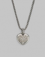 From the Hearts Collection. A sweet heart with a center of pavé diamonds hangs from a sterling silver cable bale and box chain. Diamonds, 0.23 tcw Sterling silver Chain length, about 17 Pendant length, about ¾ including bale Lobster clasp Made in USA