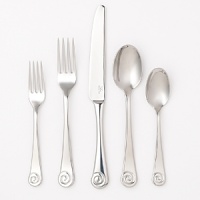 Inspired by the ammonite fossil, this contemporary stainless steel flatware has a distinctive spiral motif stamped on every handle. With a polished mirror surface and gently curving contours, this set will make a dramatic impression on the table. Inspired by the ammonite fossil, this contemporary stainless steel flatware has a distinctive spiral motif stamped on every handle. With a polished mirror surface and gently curving contours, this set will make a dramatic impression on the table.
