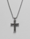 A finely detailed silver chevron cross pendant is centered with brilliant black pavé diamonds. Diamonds, 0.65 tcw Chain length 22 Imported