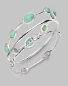 From the Silver Wonderland Collection. Richly veined, faceted ovals of bright turquoise are set all around a graceful sterling silver bangle. Turquoise Sterling silver Diameter, about 2½ Imported