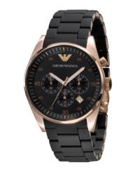A sport watch that puts equal emphasis on style, by Emporio Armani. Black silicone-wrapped stainless steel bracelet and round rose-goldtone case. Black chronograph dial features printed minute track, date window, three subdials, logo and rose-goldtone hands. Quartz movement. Water resistant to 50 meters. Two-year limited warranty. A sport watch that puts equal emphasis on style, by Emporio Armani. Black silicone-wrapped stainless steel bracelet and round rose-goldtone case. Black chronograph dial features printed minute track, date window, three subdials, logo and rose-goldtone hands. Quartz movement. Water resistant to 50 meters. Two-year limited warranty.