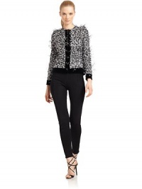 THE LOOKAllover beaded design with velvet trimFeather appliquéPadded shouldersCrewneckButton closureLong sleeves with banded velvet cuffs and button closureTHE FITAbout 21½ from shoulder to hemTHE MATERIAL88% virgin wool/7% cashmere/5% polyesterSecond fabric: 90% polyester/10% elastaneSilk liningCARE & ORIGINDry cleanMade in ItalyModel shown is 5'10½ (179cm) wearing US size 4. THE LOOKAllover beaded design with velvet trimFeather appliquéPadded shouldersCrewneckButton closureLong sleeves with banded velvet cuffs and button closureTHE FITAbout 21½ from shoulder to hemTHE MATERIAL88% virgin wool/7% cashmere/5% polyesterSecond fabric: 90% polyester/10% elastaneSilk liningCARE & ORIGINDry cleanMade in ItalyModel shown is 5'10½ (179cm) wearing US size 4.
