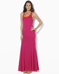 Rendered in soft cotton jersey, this layered maxi dress is crafted in a breezy, layered tank silhouette. Rendered in soft cotton jersey, this layered maxi dress is crafted in a breezy, layered tank silhouette.