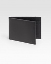 Sleek, slim design rendered in subtly pebbled calfskin leather.One billfold compartmentFour card slotsLeather4½W x3½HImported