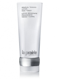 This moisturizing self-tanner tans your skin slowly and subtly resulting in an even, natural, sun kissed tan. Formulated with a delicate fresh scent and lightweight, non-greasy touch, Gradual Self Tanning Lotion is ideal for those who wish to maintain a healthy, golden glow every day of the year. 6 oz. This moisturizing self-tanner tans your skin slowly and subtly resulting in an even, natural, sun kissed tan. Formulated with a delicate fresh scent and lightweight, non-greasy touch, Gradual Self Tanning Lotion is ideal for those who wish to maintain a healthy, golden glow every day of the year. 6 oz.