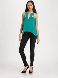 Finished with a slight hi-low hem, this fluid silk v-neck has architectural straps and edgy cutouts. V-neckSleevelessElasticized drop waistCutout backHi-low hemSilkDry cleanImportedModel shown is 5'10 (177cm) wearing US size Small. Finished with a slight hi-low hem, this fluid silk v-neck has architectural straps and edgy cutouts. V-neckSleevelessElasticized drop waistCutout backHi-low hemSilkDry cleanImportedModel shown is 5'10 (177cm) wearing US size Small.