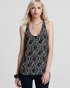 Exclusively at Bloomingdale's, an intricate lace print infuses this Joie silk tank with romance.