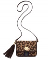 Get spotted wearing something wild with this leopard print design from Tommy Hilfiger. Sumptuous suede is  accented with custom hardware, flirty tassel and signature stripe, making it the perfect marriage of preppy and posh.