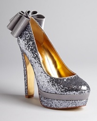 Take a big bow in these fancy, glittering platform pumps that step the look over the top with fantastical, oversized bow details; by Ted Baker. Take a big bow in these fancy, glittering platform pumps that step the look over the top with fantastical, oversized bow details; by Ted Baker.