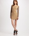 Buttery suede in an ultra-short silhouette with soft knit trim and an invisible back zipper. RoundneckLong knit sleevesInvisible back zipperFully linedAbout 16 from natural waistBody: Suede; Contrast: LyocellDry clean with leather specialistImportedModel shown is 5'10 (177cm) wearing US size 2.