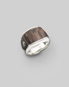 A gleaming, three-sided silver design is offset with inlaid palm wood and a logo accent. About ¾ wide at front Ring, about 1 wide Imported