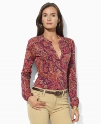 Ethereal and eclectic, Lauren by Ralph Lauren's chic splitneck top in light-as-air tissue cotton channels a bohemian sensibility with a swirling paisley print. Ethereal and eclectic, Lauren by Ralph Lauren's chic splitneck top in light-as-air tissue cotton channels a bohemian sensibility with a swirling paisley print.