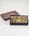 On the prowl for the purr-fect gift? This posh leopard-print wallet from Lauren Ralph Lauren is a purse pleaser. Luxe patent leather is elegantly adorned with signature hardware, while the organized interior stows currency with care. Presented in a signature gift box.