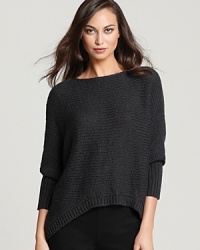 A closet staple reaches statement status as a chic boat neckline and trend-right boxy silhouette embolden an essential Eileen Fisher top. A closet staple reaches statement status as a chic boat neckline and trend-right boxy silhouette embolden an essential Eileen Fisher top.