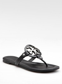 The highlight of this leather thong is the polished, metal logo.Screw detail Leather lining Padded insole Rubber sole ImportedOUR FIT MODEL RECOMMENDS ordering true size. The highlight of this leather thong is the polished, metal logo.Screw detail Leather lining Padded insole Rubber sole ImportedOUR FIT MODEL RECOMMENDS ordering true size.